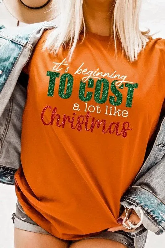 It's Beginning TO COST a lot like Christmas Unisex Graphic Tee